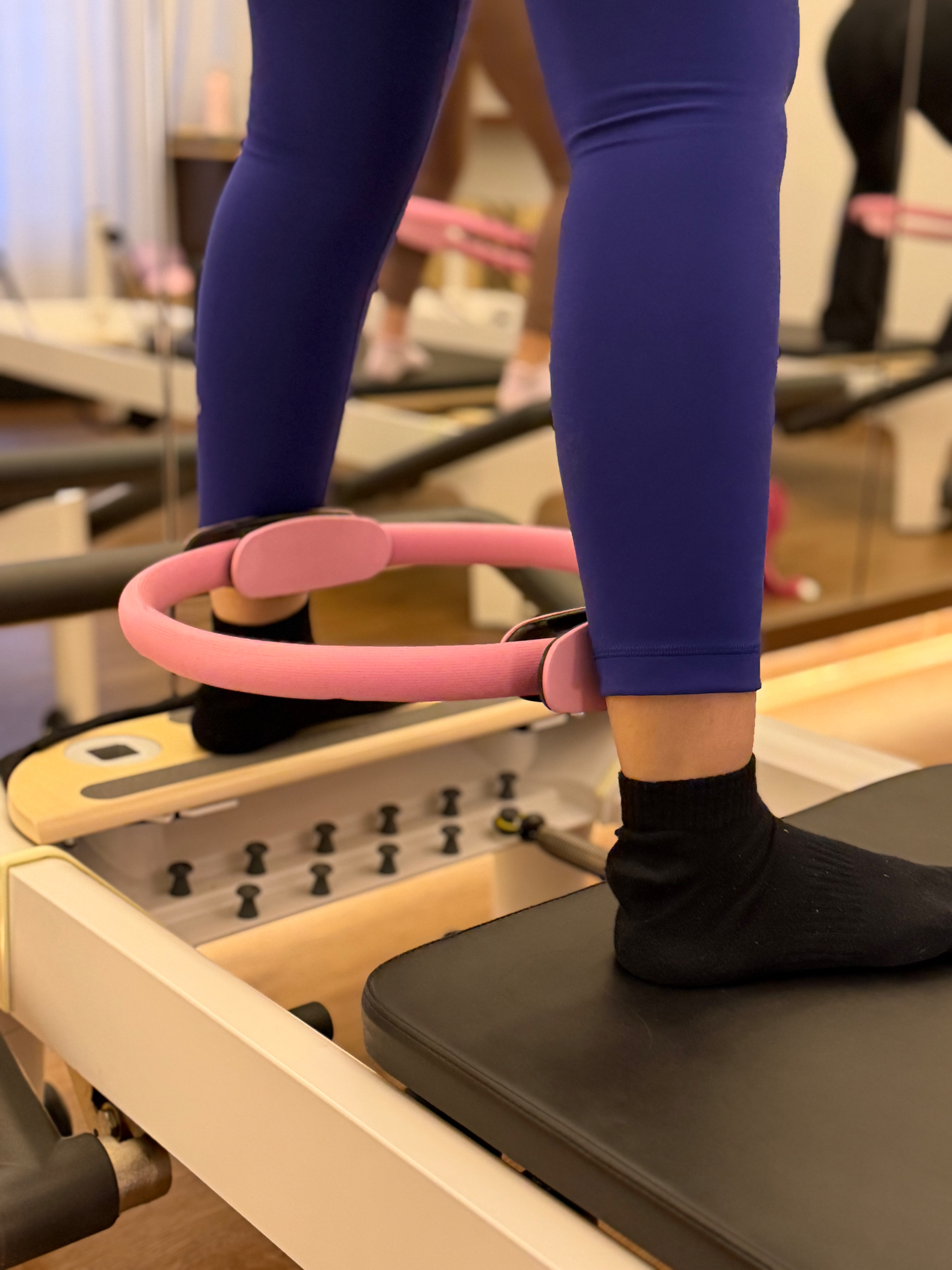 Pilates ring work on the reformer